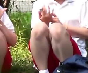 Asian babe fingers les